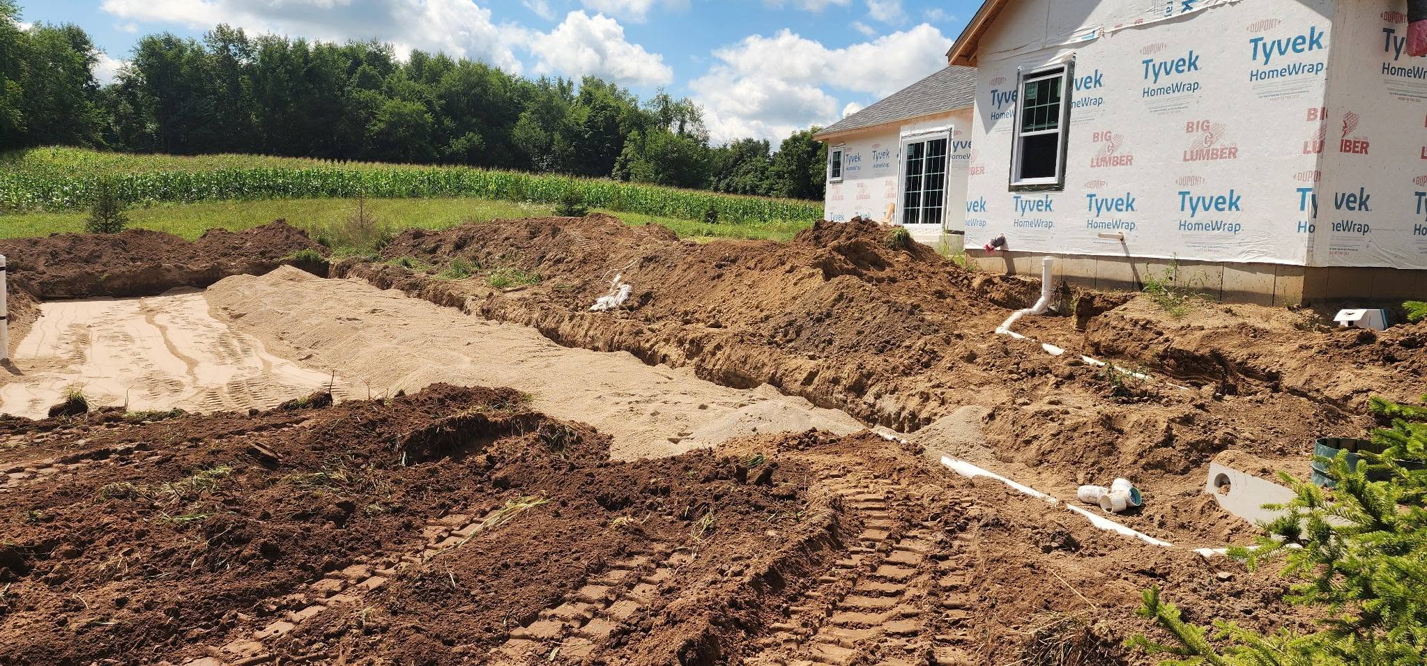 Precision Septic & Excavating installing a septic system at a residential property