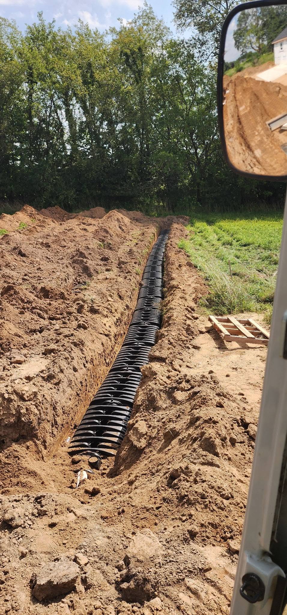Drain field chambers set in a trench during a Precision Septic installation